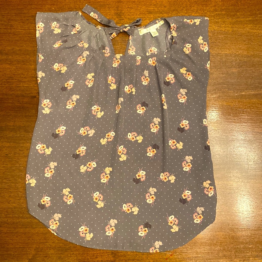 Lauren Conrad floral tank top blouse with tie neck on back.